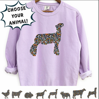 Purple sweatshirt with a colorful animal design on a white background