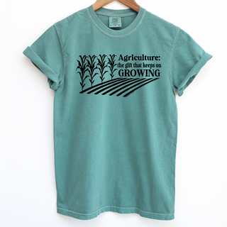 The Gift That Keeps On Growing – Comfort Colors T-Shirt