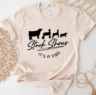 $20 T-SHIRT TUESDAY - STOCK SHOWS IT'S A VIBE – Bella Canvas T-Shirt