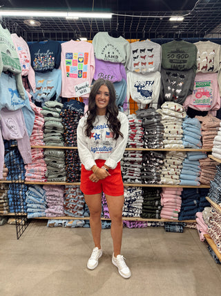 Kodye posing at a show for Wandering Maverick Boutique